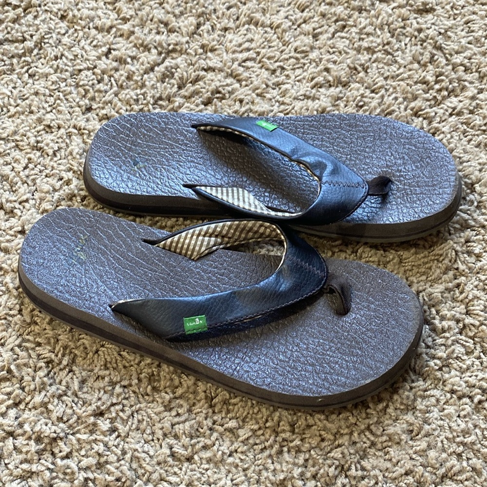 Brown flip flops